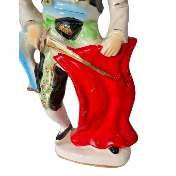 Vibrant Mid Century Bullfighter Figurine
Matador Statue With Sword & Red
Cape - Picture 9 of 12